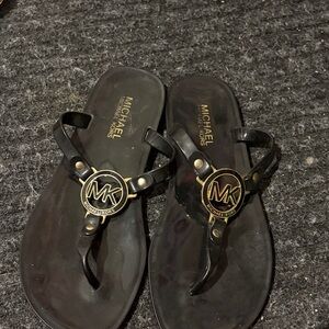 Michael Kors Black Sandals with Gold Emblem
